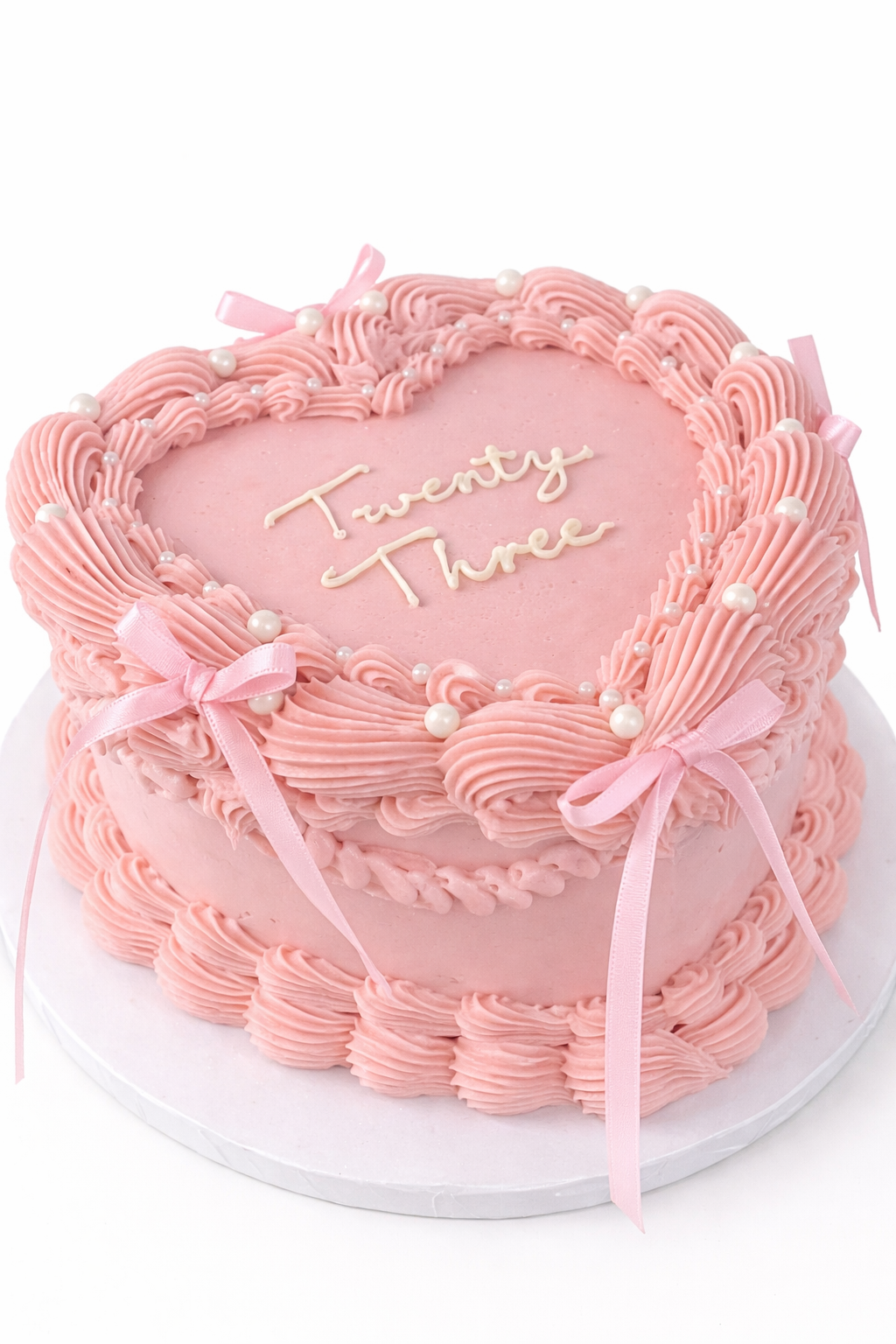 Torta Corazón rosada con moños tortas corazon bogota 
tortas bogota personalizadas
tortas personalizadas en bogota
tortas de cumpleaños bogotá