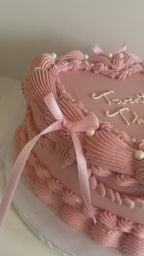 Torta Corazón rosada con moños